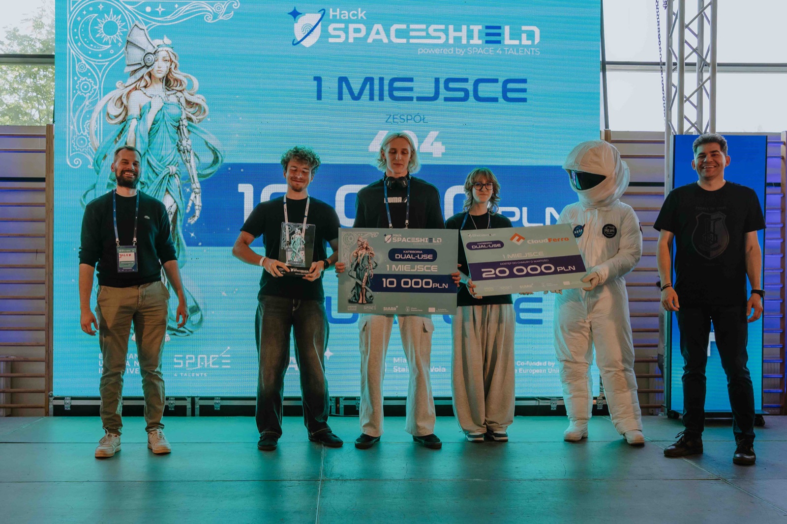 Jakub Siuda and team 404 receiving the first-place award at SpaceShield Hack 2026